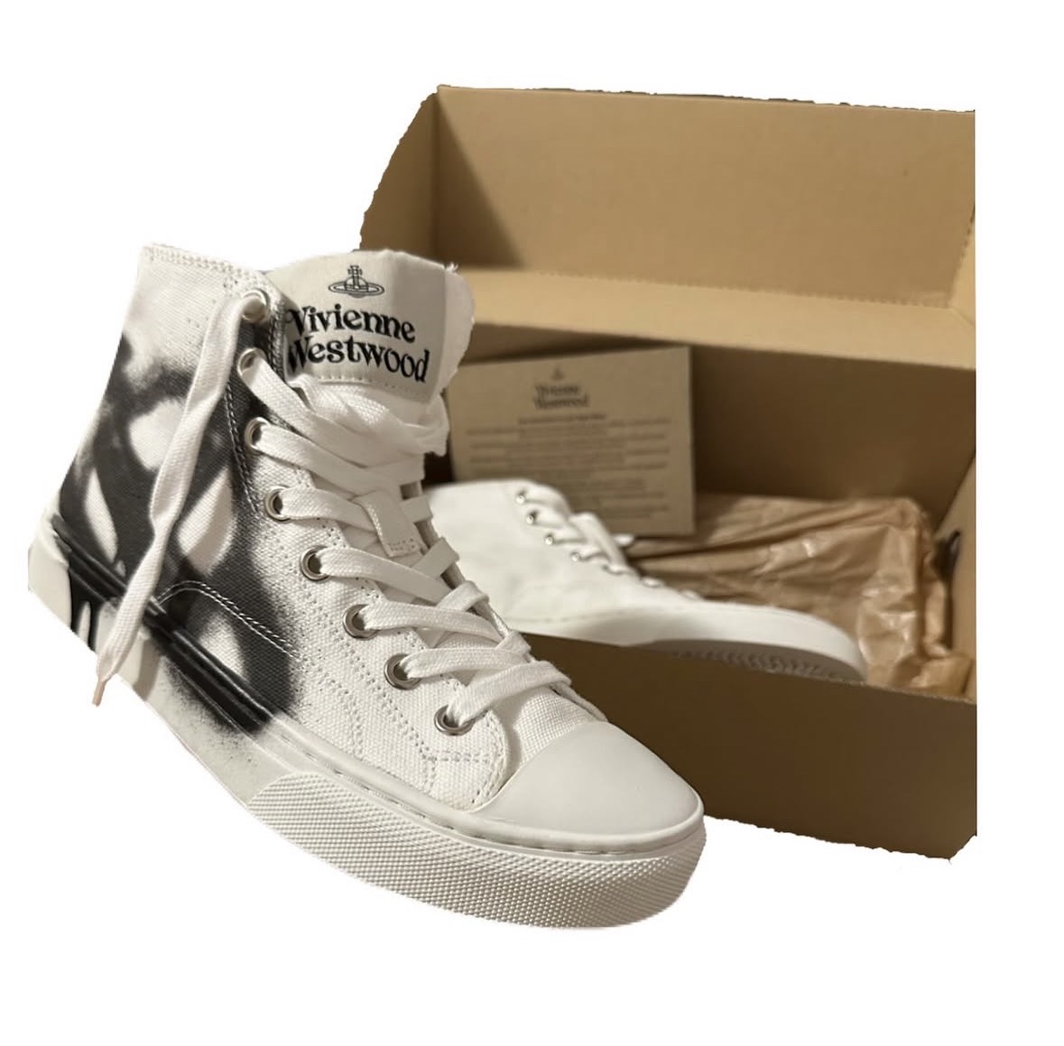 White high top graffiti sneakers